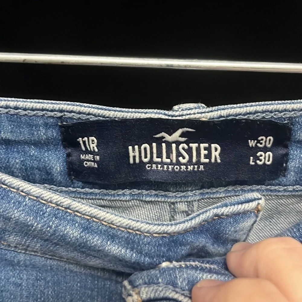HOLLISTER- high rise super skinny distressed jeans